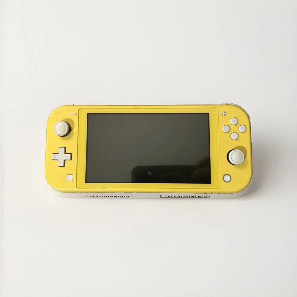 Nintendo Switch Lite Yellow Handheld Console Tested Works w/ microSD Card